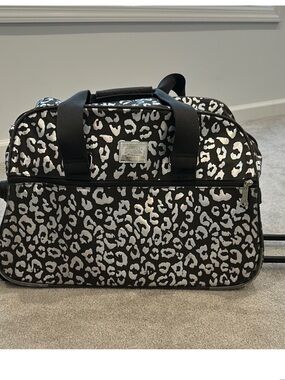 Pink Victoria’s Secret carryon
